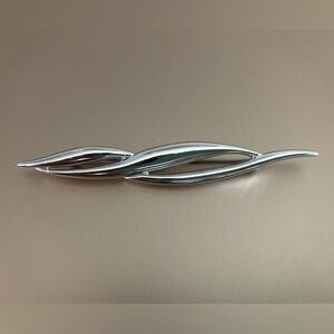 Monet Signed 3 Inch Chrome Trinity Stick Brooch